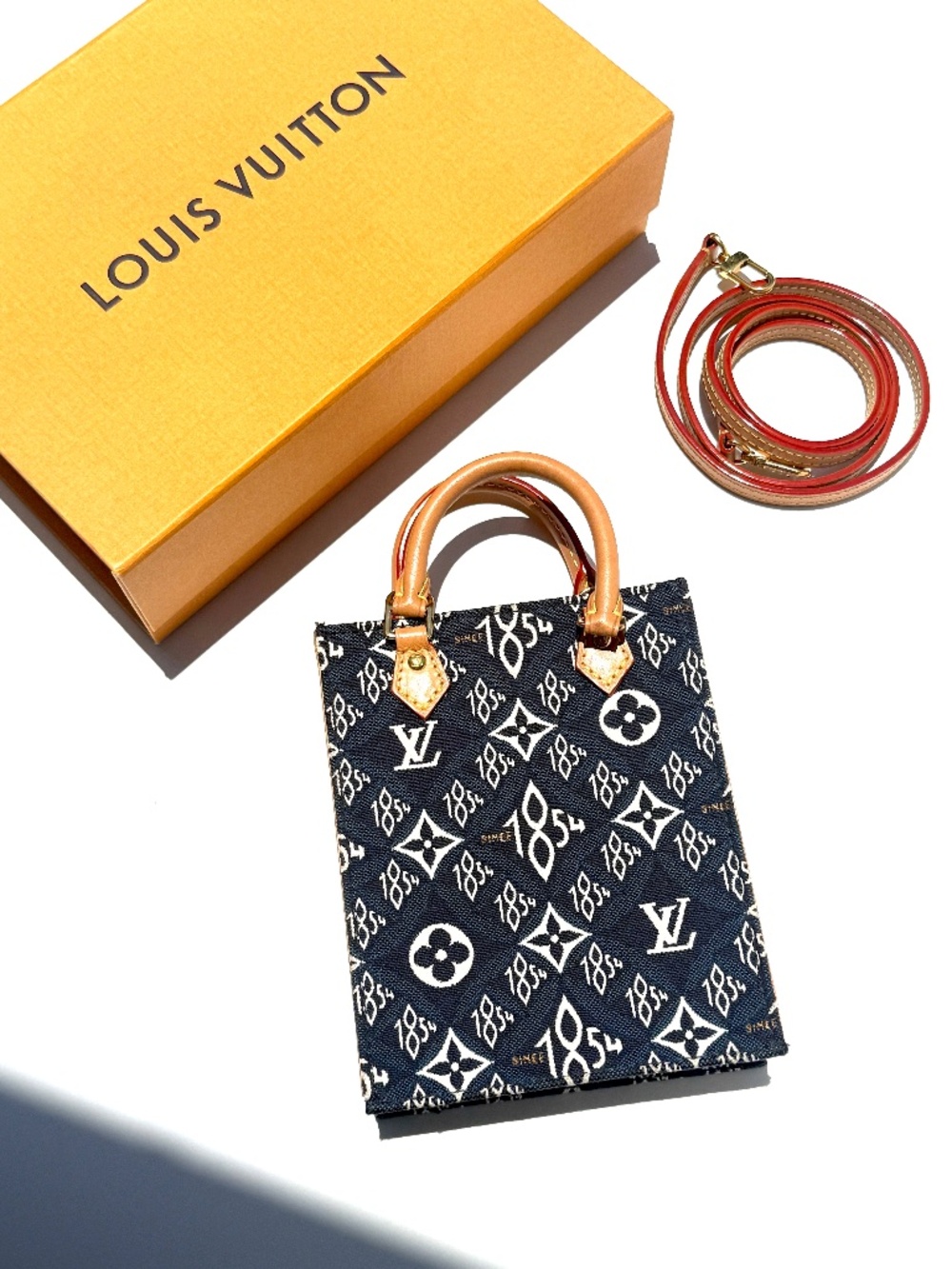Louis Vuitton Since 1854 Petit Sac Plat Vertical Blue Canvas Monogram